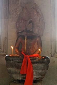Old Hindu statue at Angkor Wat temple in Cambodia