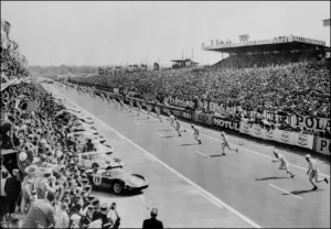 <b class=qtipBold><figcaption>Le Mans-24 Hour Race</figcaption></b><br>Pilots rush to their racing cars during the start of the 32 "Le Mans 24-Hour Race" (24 Heures du Mans), Le Mans, 20 June 1964. French Jean guichet and Italian Nino Vaccarella won the competition, driving a Ferrari 275 YP. Fifty five cars were taking part in the French enduring race, which first held in 1923. / AFP PHOTO<br><em>© Copyright Agence France-Presse (AFP) - All Rights Reserved</em> Le Mans-24 Hour Race