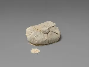 Valley Of The Kings Gallery: Bag of Natron from Tutankhamuns Embalming Cache, c.1336-27 B.C. (linen, natron)