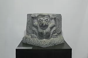 Garuda Collection: Humanoid bird Garuda, corner of a pedestal, 13th-14th century (stone)