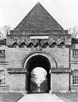 Gatehouse Collection: The second archway and hostelry building, Castle Howard, from The English Country House (b/w photo)