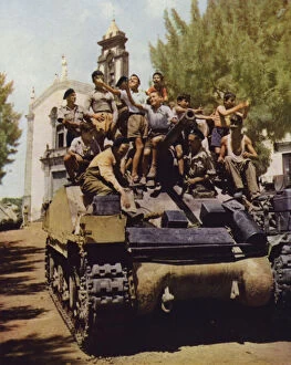 Enjoying Collection: Tank of the British Eighth Army giving a ride to a group of children, Milo, Sicily, Italy