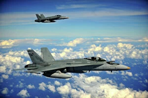 Cloud Collection: Two Royal Australian Air Force F / A-18 Hornets