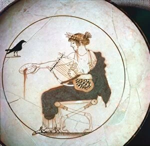 Seated Gallery: Apollo offering a libation to the raven, kylix, 5th century BC