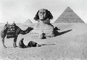 Cairo Collection: Praying before a sphinx, Cairo, Egypt, c1920s