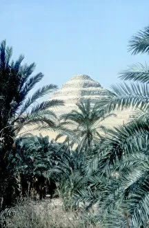 Ancient Egyptian Architecture Gallery: Step Pyramid (behind palms) of King Djoser, Saqqara, Egypt, 3rd Dynasty, c2600 BC. Artist: Imhotep