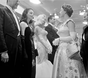 Men And Women Collection: Ava Gardner with the Queen during a Royal Command Film Performance, October 1955