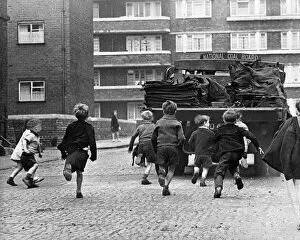 Cobble Collection: Toddlers in Merseyside running after National Coal Board Lorries and trying to jump