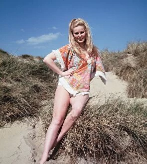 Veronica Carlsone actress who appeared in Hammer Horror films, poses on Camber Sands